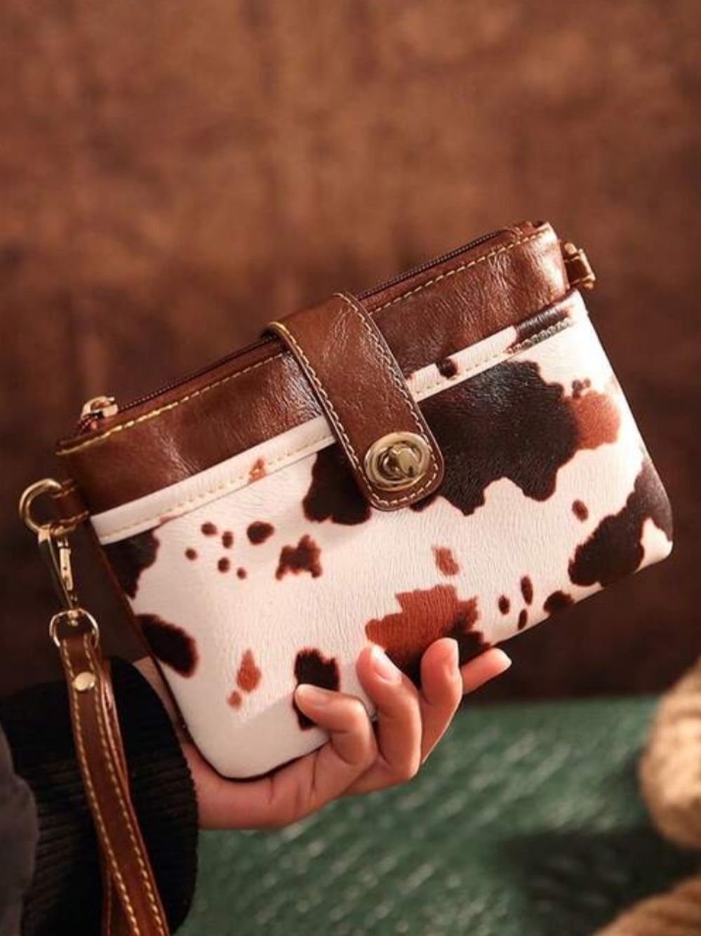 Cowhide-Print Wristlet Clutch in Brown and White